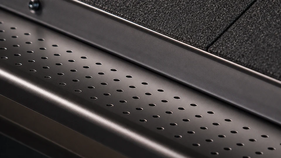 Illustrative close-up of the perforated aluminum gutter guard surface
