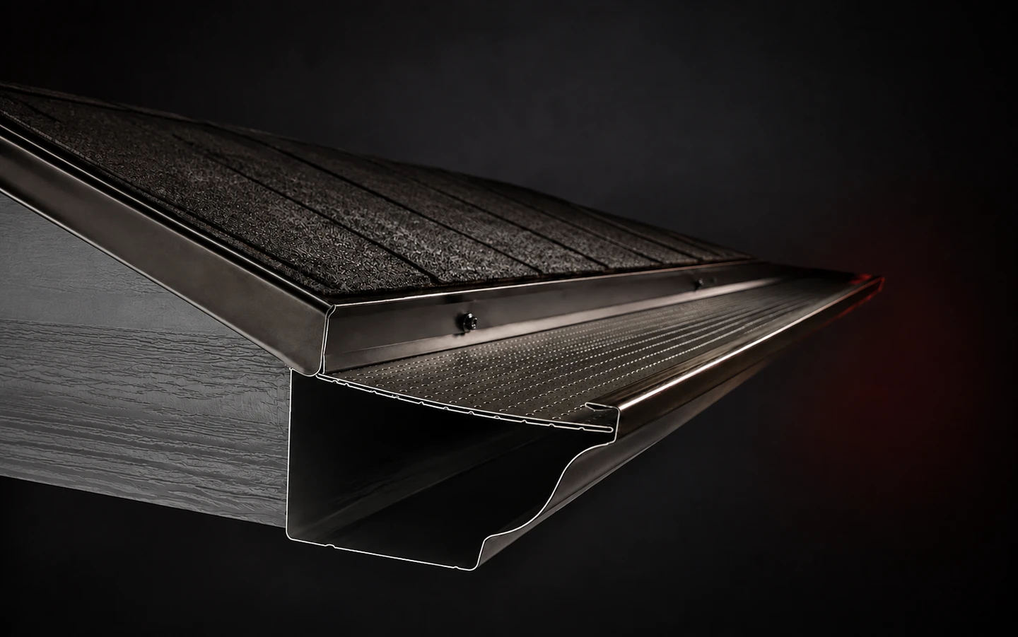 Product illustration cutaway of the dual-layer perforated aluminum gutter guard with integrated support